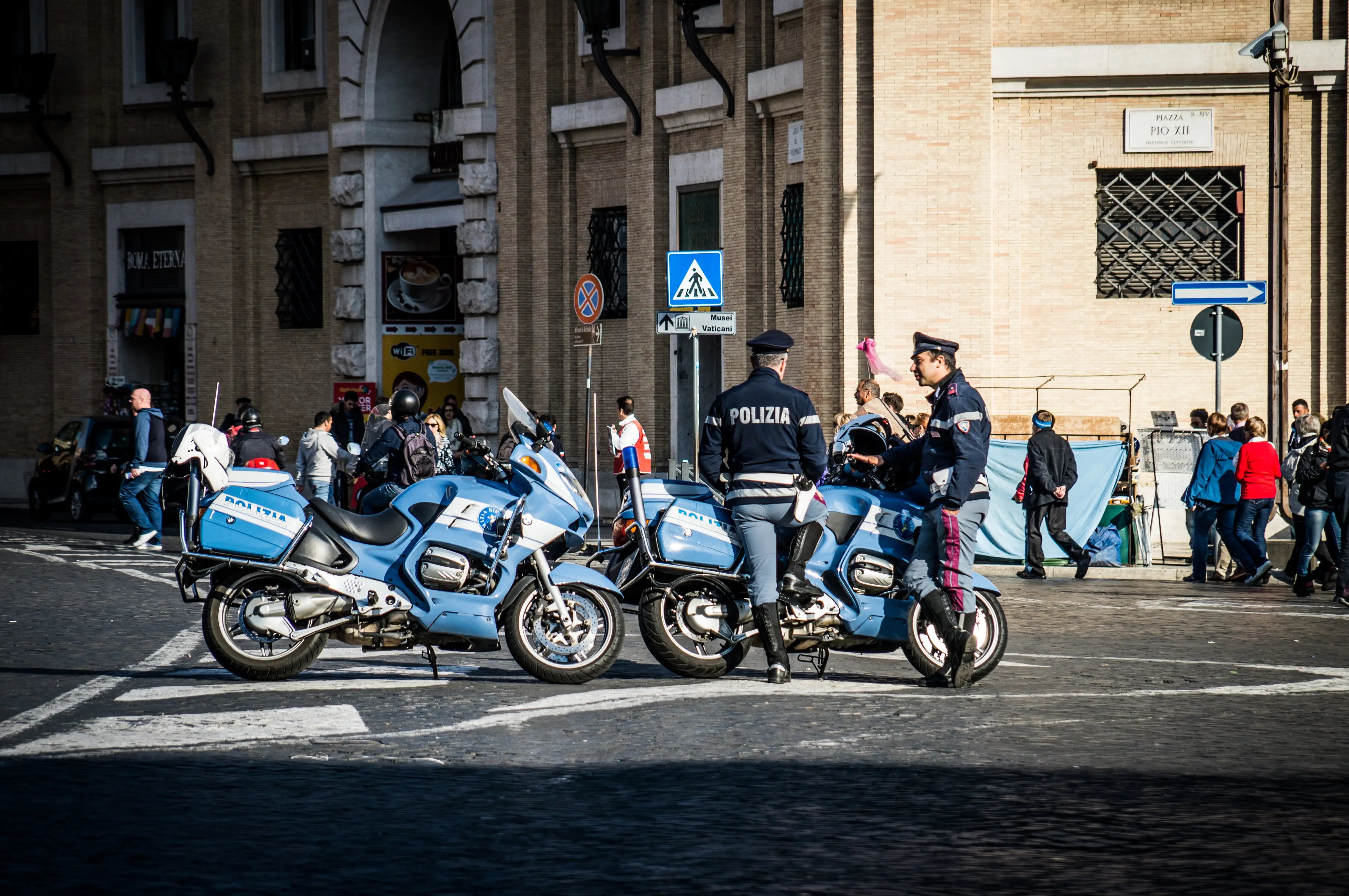 Police motorcycles parked on an urban street illustrating motorcycle security and theft prevention.